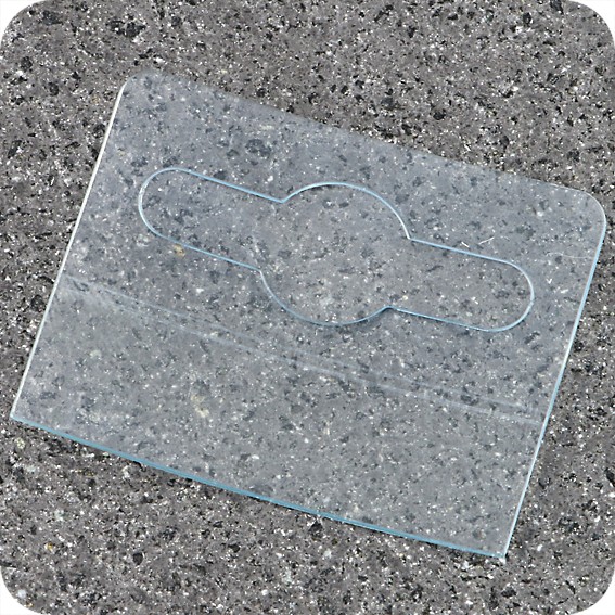Plastikiniai lipnūs laikikliai su euro skyle 40 x 32mm, skaidrūs, Ritinys 500vnt.