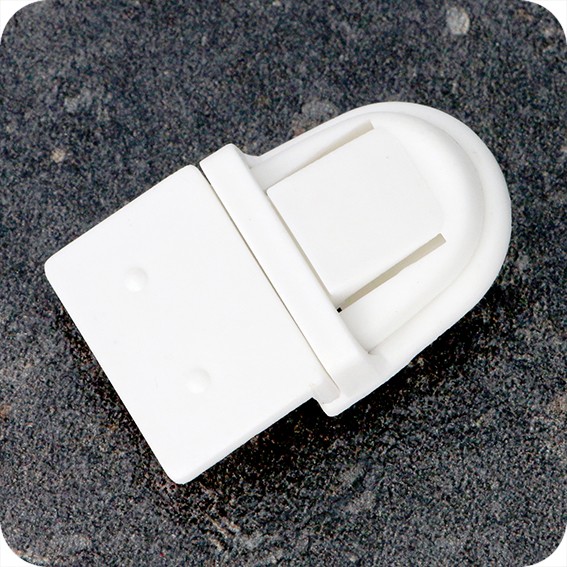 Plastikinės sagtys 40 x 25 x 9mm, baltos sp.